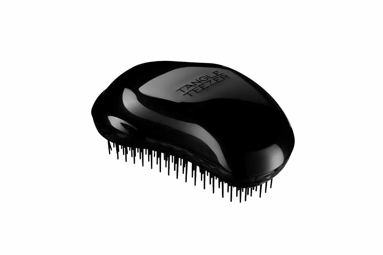Brosse à cheveux de voyage dans un emballage d'articles de toilette