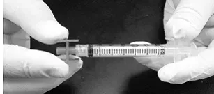 Firmly connect the mixing syringe - Illustration