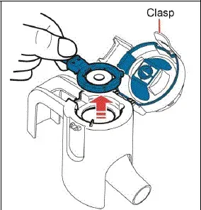 Remove the Aerosol head from the Handset body by lifting the clasp on the side of the Handset body as shown. - Illustration
