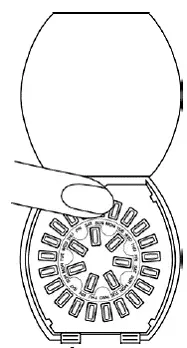Remove the first pill at the top of the dispenser - Illustration