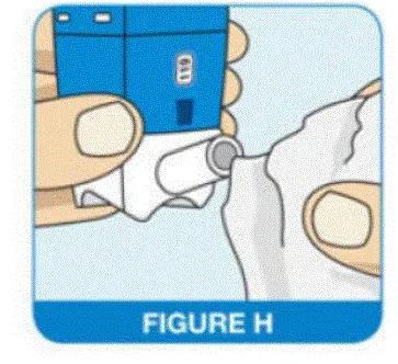 Wipe the nasal actuator tip with a clean dry tissue or cloth - Illustration